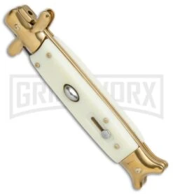 9" Sharksfin Stiletto Sim Ivory Automatic Knife - Black Plain 8 9" Sharksfin Stiletto Sim Ivory Automatic Knife - Black Plain -Grindworx 9in Sharksfin Stiletto sim ivory black BP 20685 er spine large