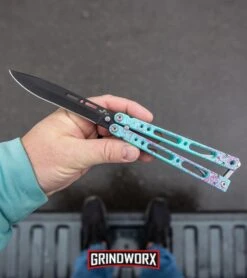 Bear Ops Bear Song IV Cyan Speckle Blue Butterfly Knife - Black -Grindworx Bear Ops Bear Song IV Butterfly Knife Cyan Speckle Blue Black BHQ 83465 kp in hand web large