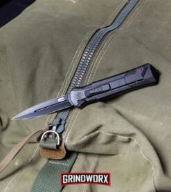 Smith & Wesson Spring Assisted Finger Actuator Spear Point OTF - Black Serr -Grindworx MP OTF Spring Assisted Spear Point Knife Gray Black BHQ 80731 kp lifestyle web large